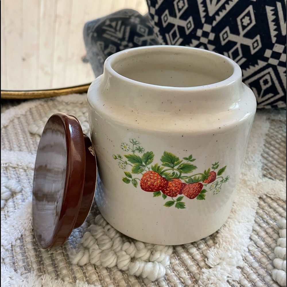 Vintage ceramic canister with a precious strawberry print.